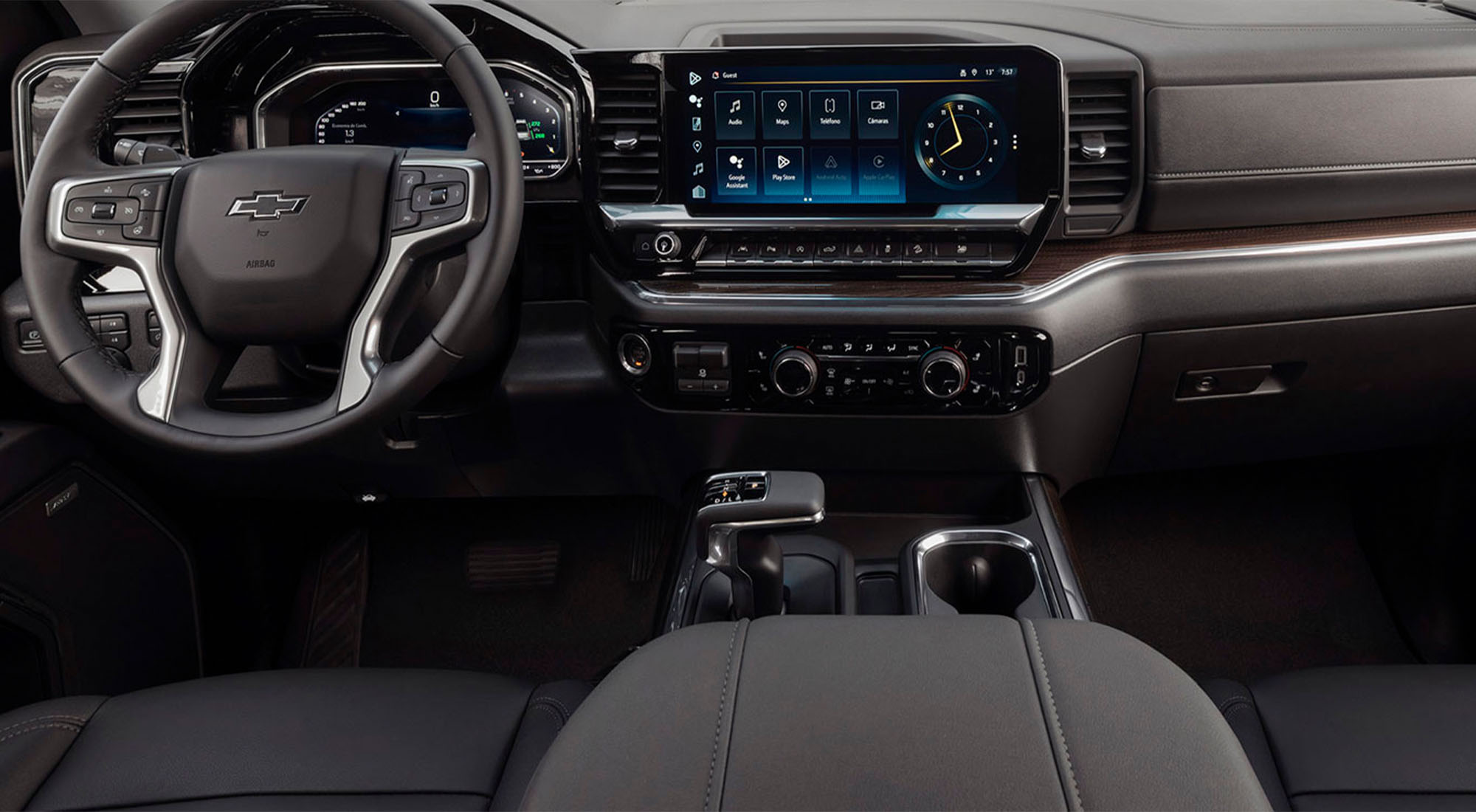 Interior con volante, pantalla táctil y guantera, Silverado 2026